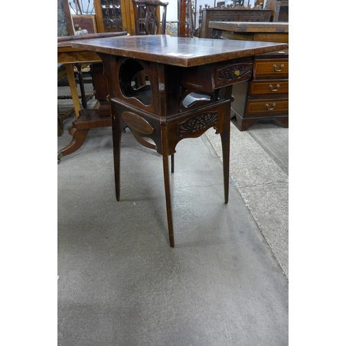 211 - An Arts and Crafts mahogany occasional table, manner of Liberty & Co. and an oak occasional table