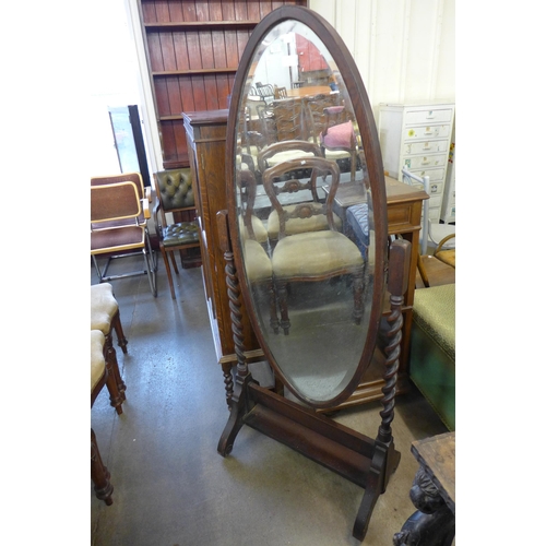 232 - An early 20th Century oak barleytwist cheval mirror