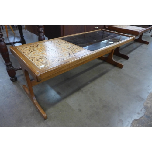 27 - A G-Plan Fresco teak, tiled and glass topped coffee table
