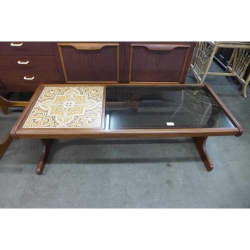 28 - A G-Plan Fresco teak, tiled and glass topped coffee table