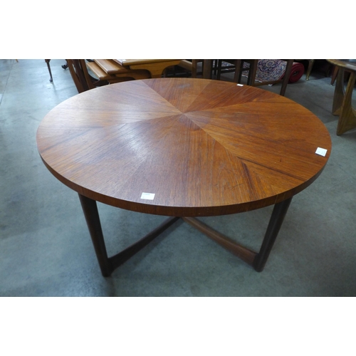 4 - A McIntosh teak circular sunburst coffee table