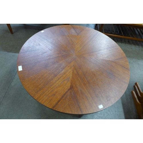 4 - A McIntosh teak circular sunburst coffee table