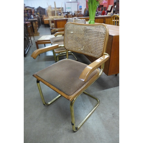 63 - A set of three Marcel Breuer style cantilever chairs