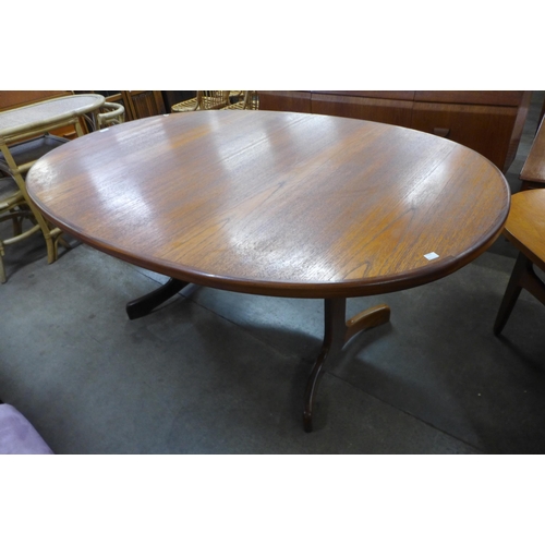 66 - A G-Plan Fresco teak extending dining table