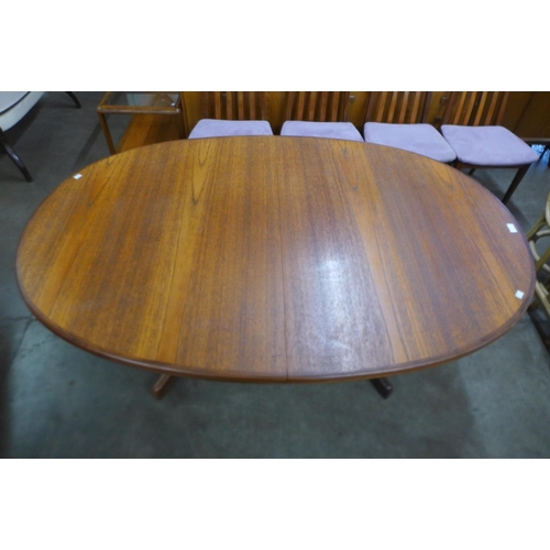 66 - A G-Plan Fresco teak extending dining table