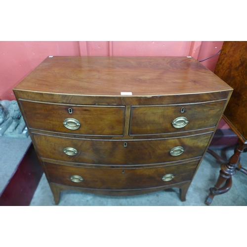 85 - A George III mahogany bow front chest of drawers