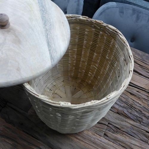 1360 - A Pair of small woven raffia baskets  * This lot is subject to VAT