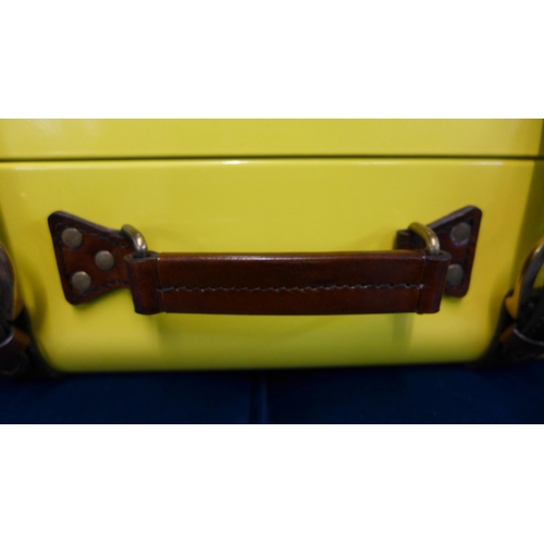 1399 - A small yellow handcrafted leather storage trunk