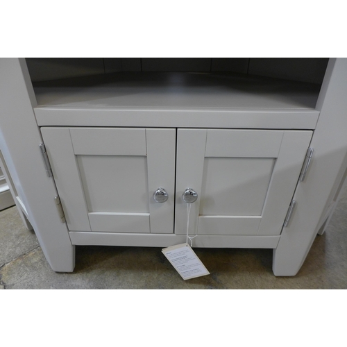 1402 - A 90 degree corner TV unit with 2 doors and 2 shelves  * This lot is subject to VAT