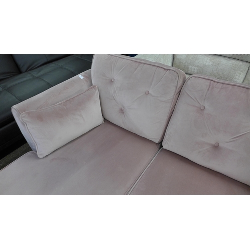 1409 - A pink velvet L shaped sofa