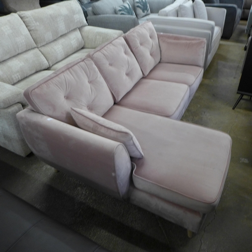 1409 - A pink velvet L shaped sofa