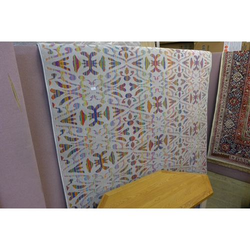 1596 - A multi-coloured designer carpet with all over contemporary design, 200cm x 300cm