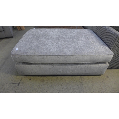 1608 - A grey two seater chesterfield style sofa with missing back cushions and large pewter upholstered fo... 