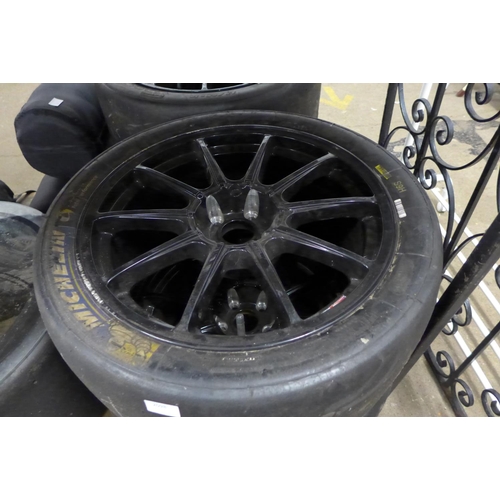 2098 - 4 WB/GB alloy wheels with Michelin tyres and Avon racing Perspex topped tyre table