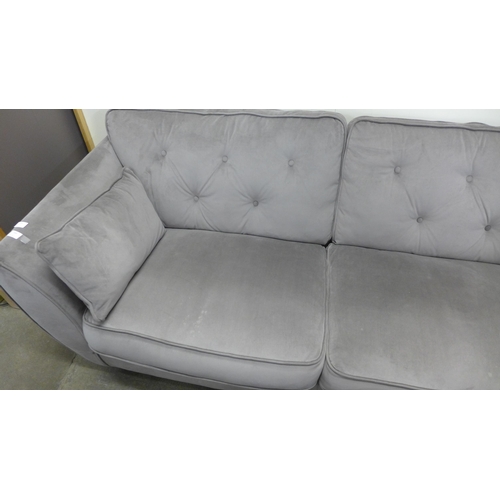 1386 - A Hoxton mink velvet upholstered three seater sofa and footstool