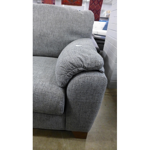 1393 - A grey flecked three seater sofa