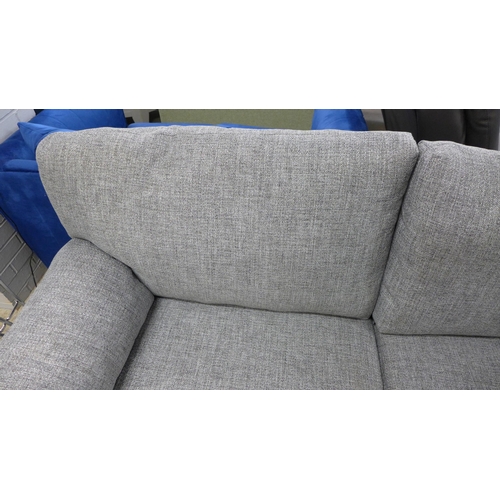 1393 - A grey flecked three seater sofa