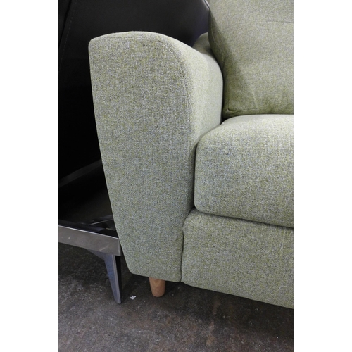 1447 - An olive green two seater sofa