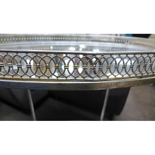 1458 - A silver mirrored drinks trolley