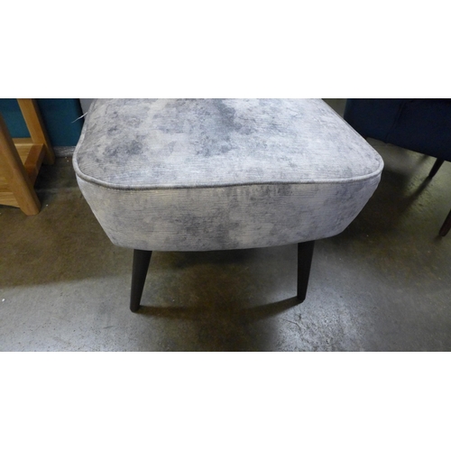 1469 - A pewter velvet side chair