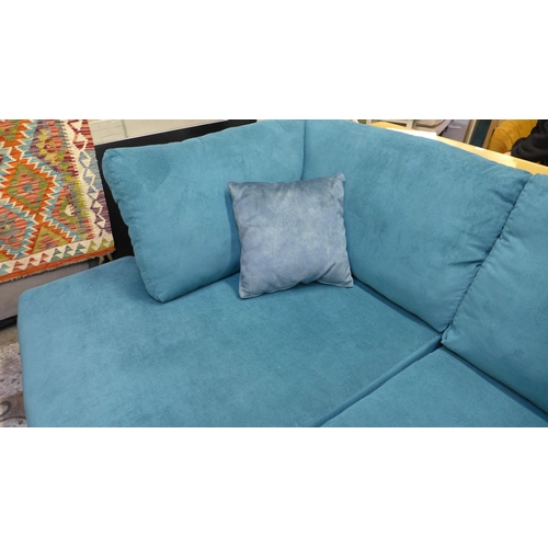 1472 - A turquoise corded L shaped sofa