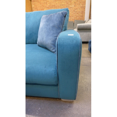 1472 - A turquoise corded L shaped sofa