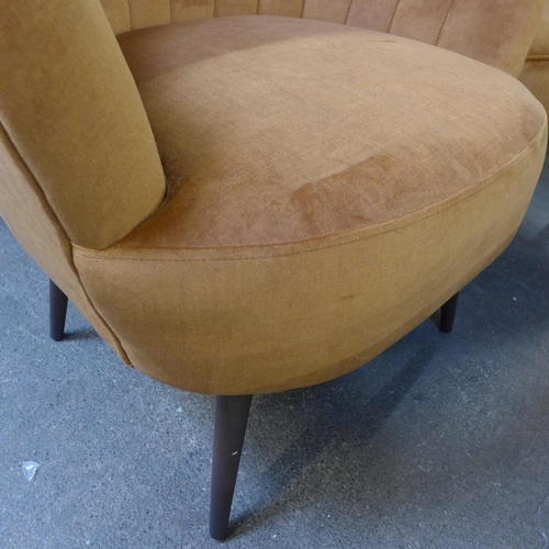 1487 - An ochre velvet shell chair