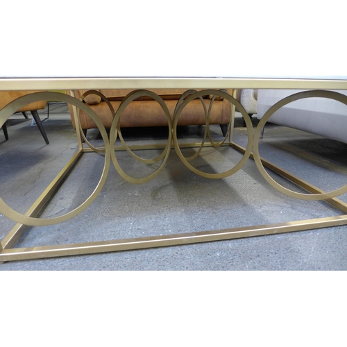 1490 - A marble and gold coffee table * this lot is subject to VAT