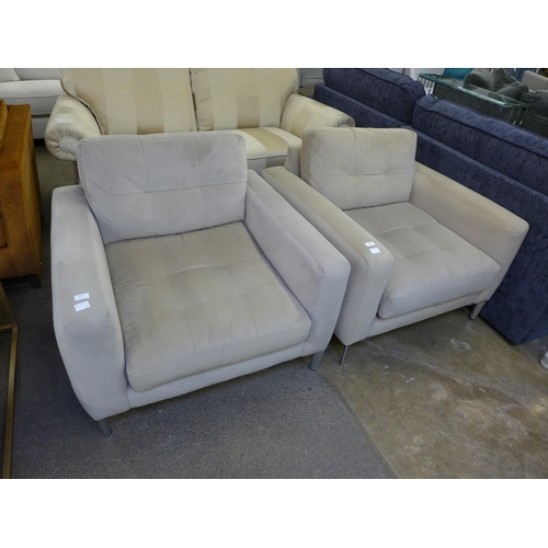 1492 - A grey velvet pinched back armchair