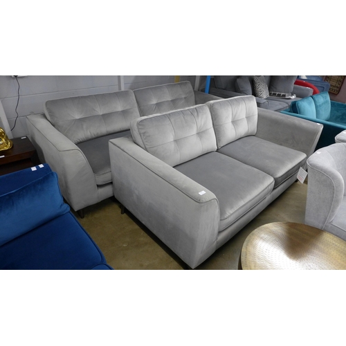 1509 - An aluminium velvet three and four seater sofa