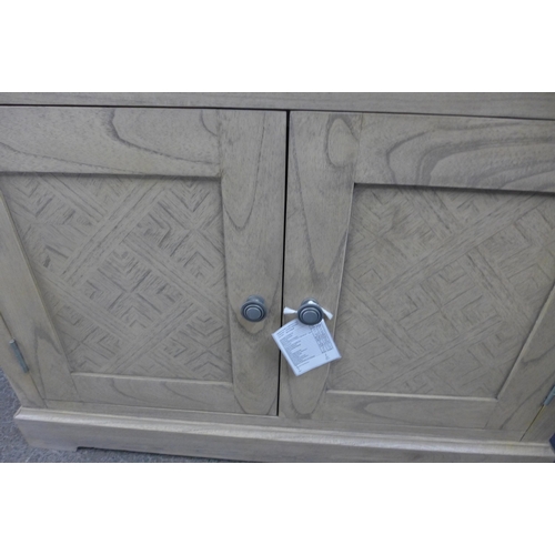 1520 - A washed finish two door sideboard * this lot is subject to VAT