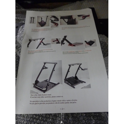 2103 - Boxed gaming wheel stand, boxed & unused