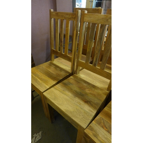 1570 - Eight hardwood dining chairs * this lot is subject to VAT