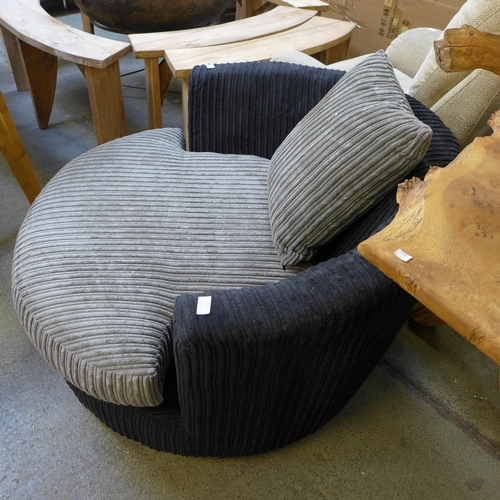 1591 - A black and grey swivel armchair