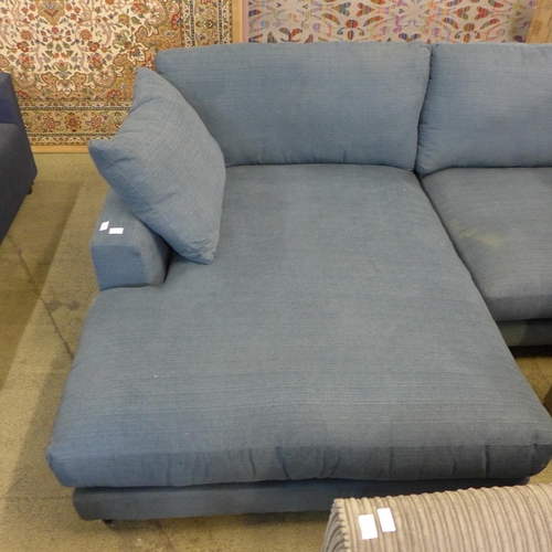 1597 - A petrol blue L shaped sofa