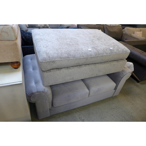 1608 - A grey two seater chesterfield style sofa with missing back cushions and large pewter upholstered fo... 