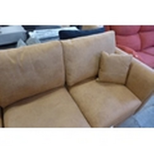 1620 - A tan upholstered four seater sofa