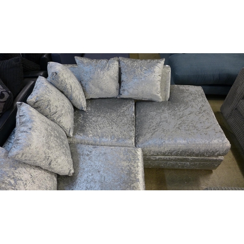 1592 - A silver velvet corner sofa