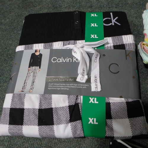 3253 - 4 sets of ladies branded pyjamas, including Disney, DKNY and Calvin Klein - mixed size  *This lot is... 