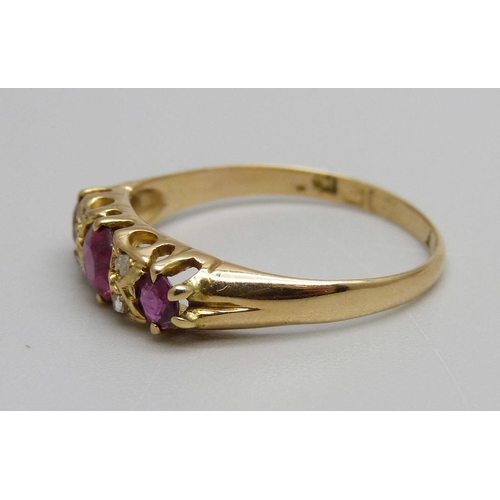 1000 - A 18ct gold, ruby and diamond ring, one diamond replaced, 2.3g, Q