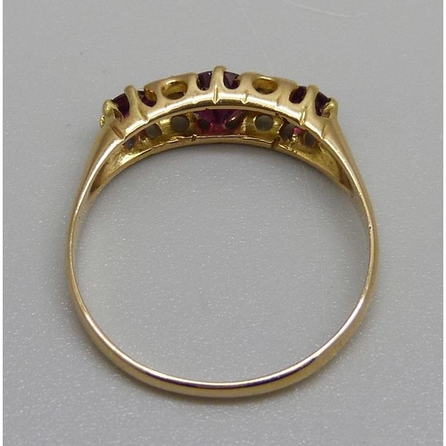 1000 - A 18ct gold, ruby and diamond ring, one diamond replaced, 2.3g, Q