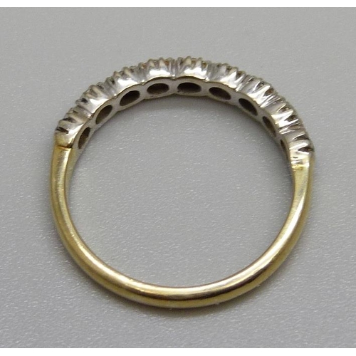 1001 - An 18ct gold, sapphire and diamond band, 3.1g, O