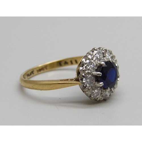 1006 - An 18ct gold, platinum set, sapphire and diamond cluster ring, 2.6g, L