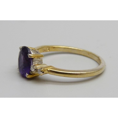 1010 - A silver gilt, amethyst and white stone ring, N