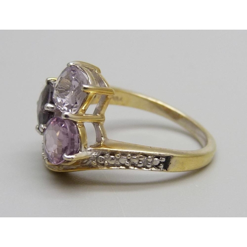 1012 - A silver gilt Burmese purple spinel with diamond accents, L