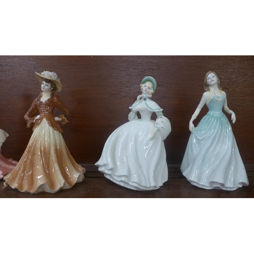 602 - A Royal Doulton Pretty ladies figure, boxed, three others and two Coalport