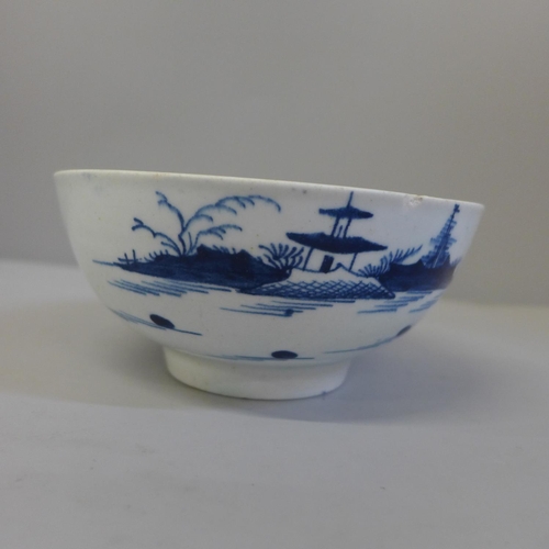 603 - A large Christian, Liverpool, blue and white tea bowl (for the American market), a/f