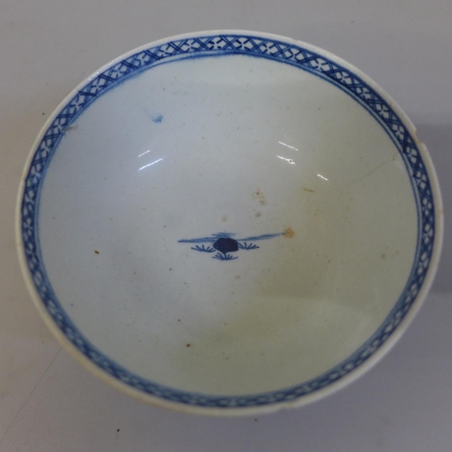 603 - A large Christian, Liverpool, blue and white tea bowl (for the American market), a/f