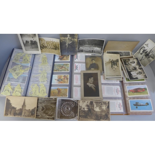 604 - A collection of Edwardian postcards and three albums of Doncella cards