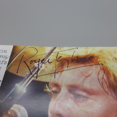 613 - Queen; a Roger Taylor signed fan club magazine